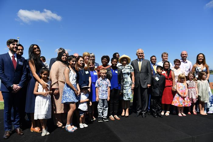Prime Minister Malcolm Turnbull poses for a photo with new Australian citizens at an Australia Day Citizenship Ceremony and Flag Raising event in Canberra, Thursday, Jan. 26, 2017. (AAP Image/Mick Tsikas) NO ARCHIVING